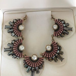 Clear and free bold statement necklace from Avon. New in box